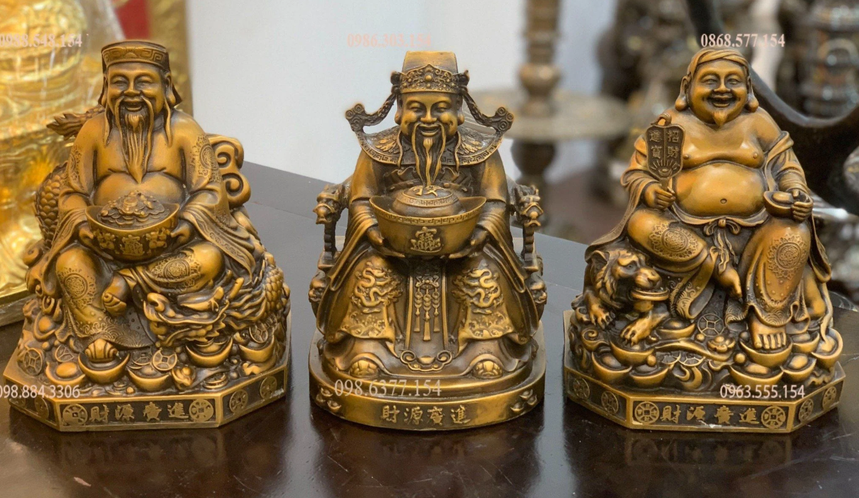 Tượng thần tài thổ địa thần tiền.png